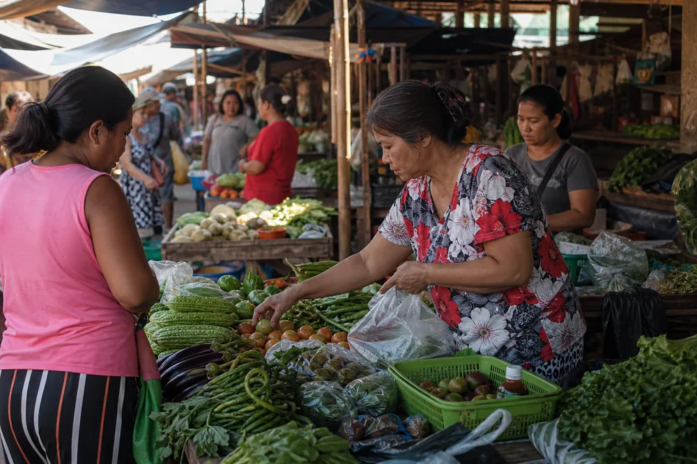 Vendors and shoppers at a morning market